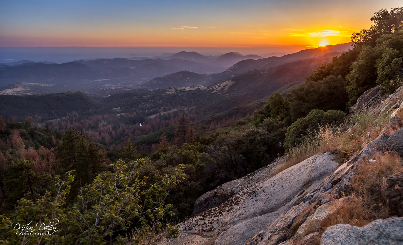 Sunset spreading across layered Sierra Nevada ridges near Sequoia National Park